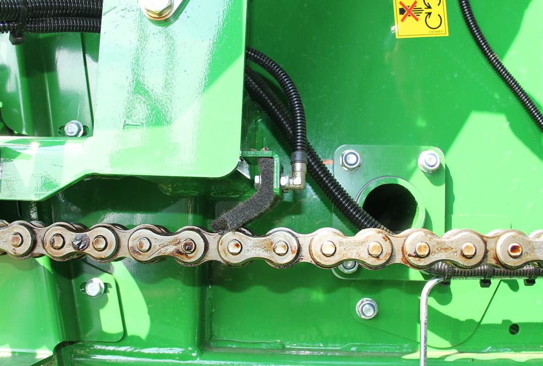 Prasa zmiennokomorowa McHale V660 - smarowanie łańcuchów