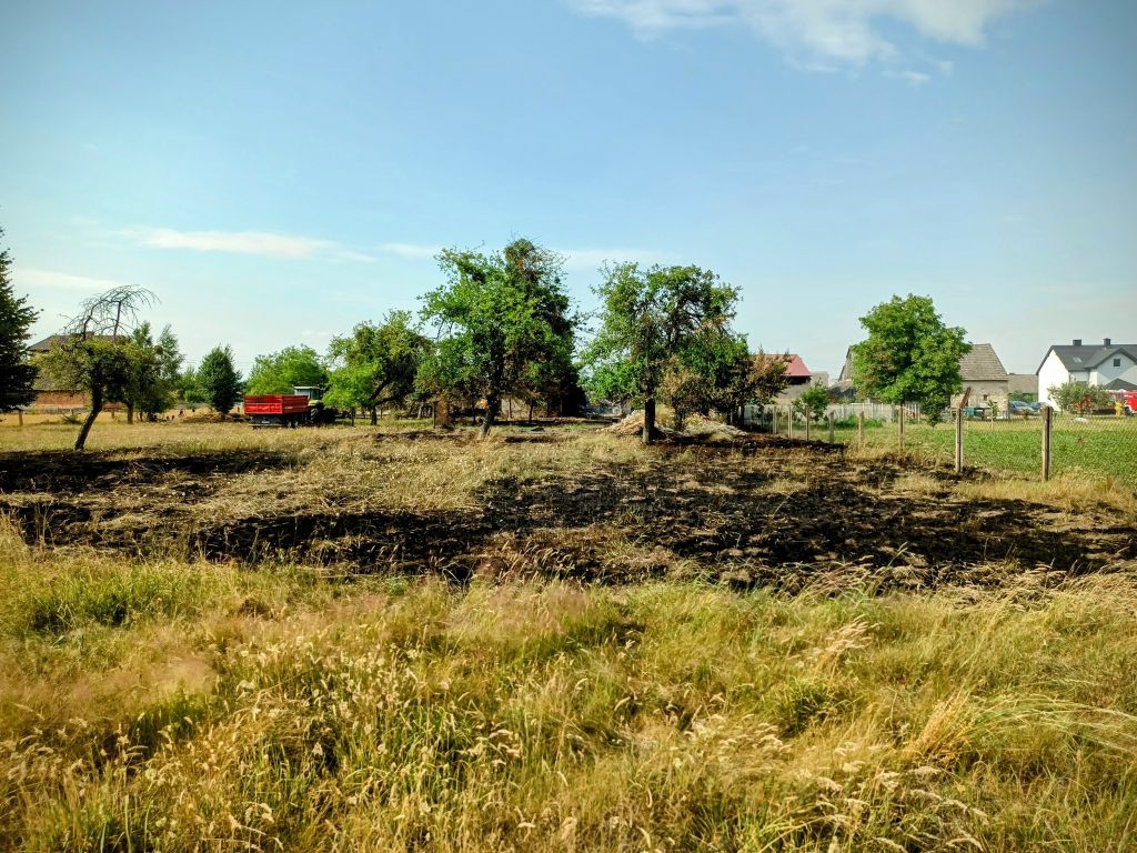 pożar, trawy, budynki gospodarcze, ranny gospodarz